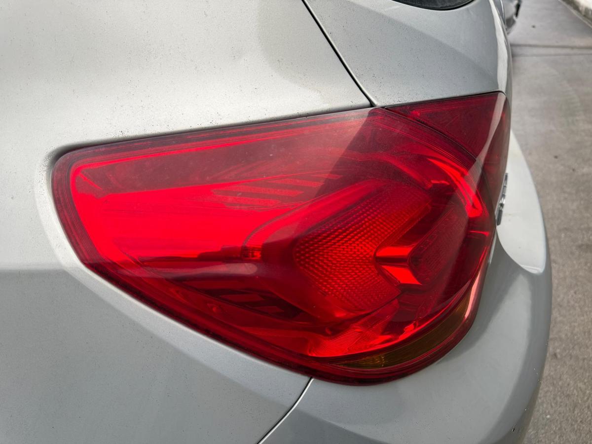 Opel Astra J original Rücklicht Rückleuchte außen links Fließheck Vorfacelift BJ09